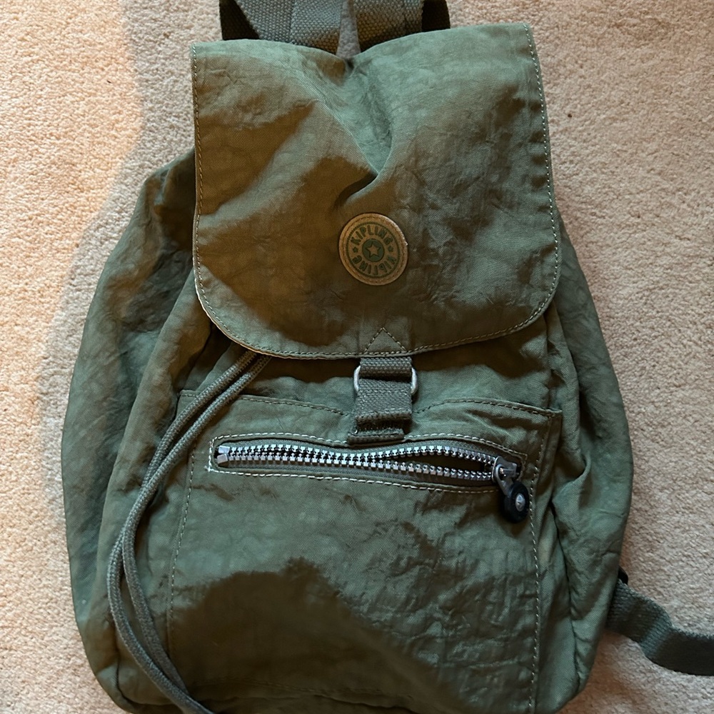 Kipling backpack everyday olive green with drawstring closure and zip pockets
